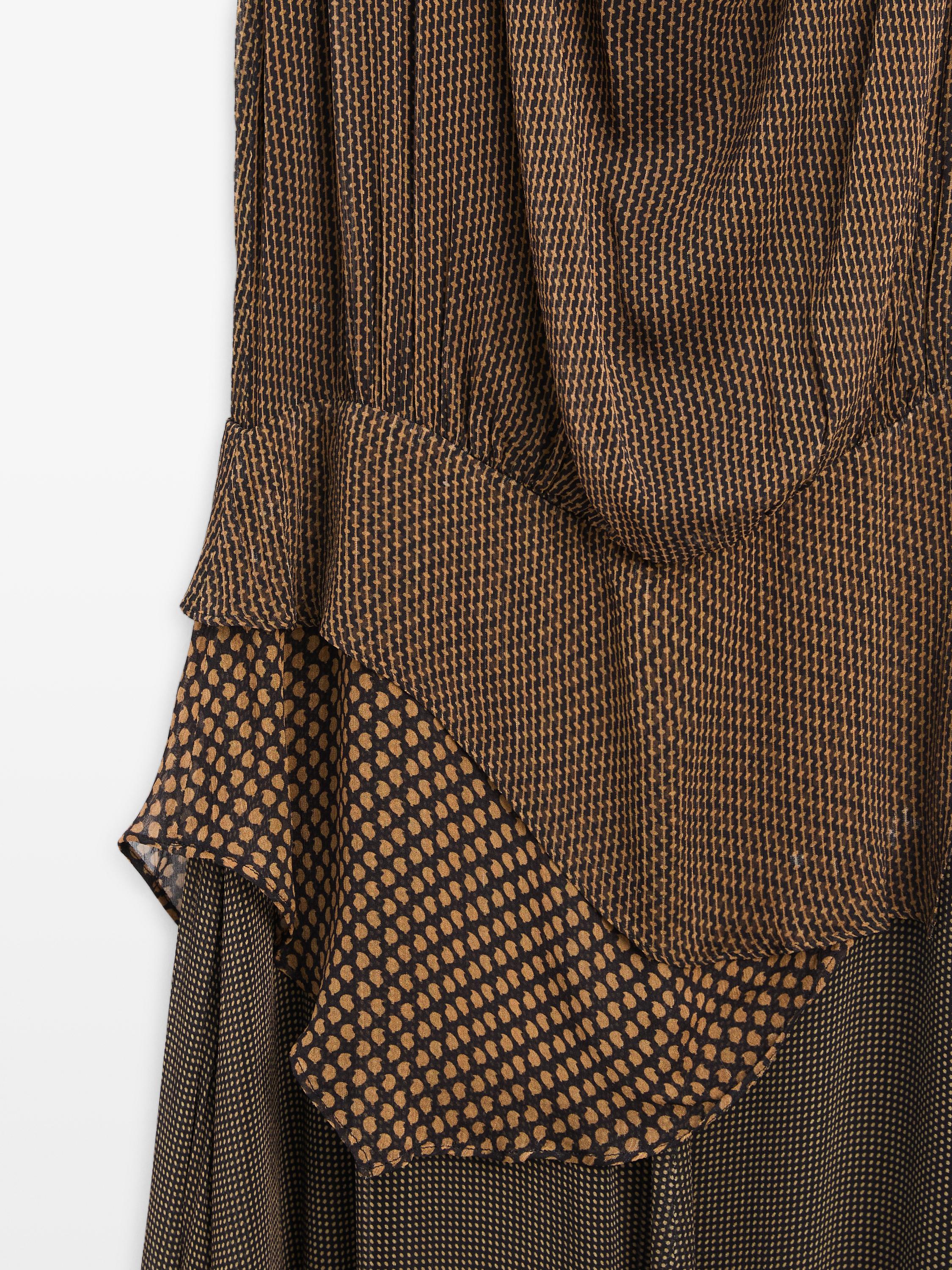 Flowing layered dress with ruffles